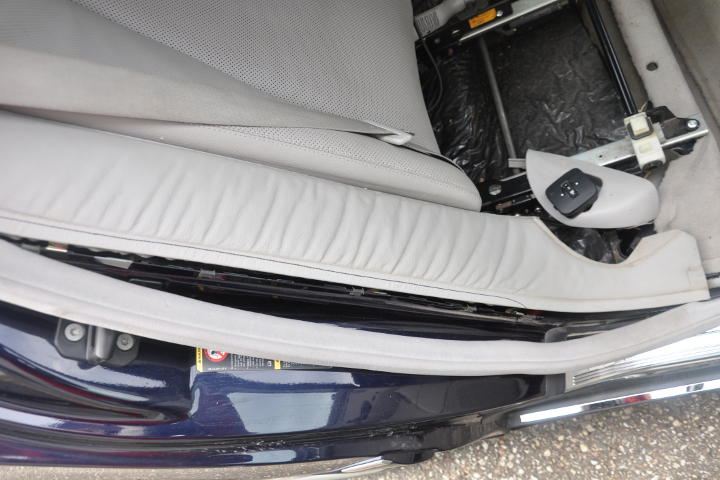 File:W220 rear seat backrest side paneling retaining clamps.jpg