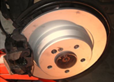 File:W220 Reinstalled Wheel Carrier, New Discs and Brake Pads.JPG