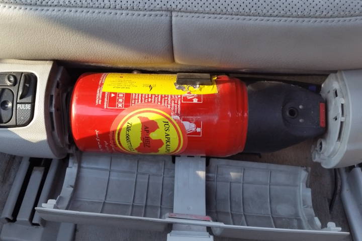 File:W220 drivers seat fire extinguisher.jpg