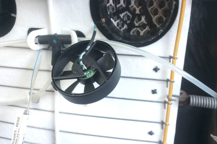 File:W220 front seat ventilation fan wire soldering broken.jpg