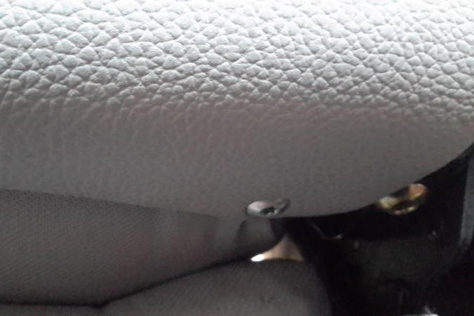 File:W220 seat backrest lining screw.jpg