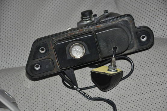 File:W220 trunk lock latch rear camera drilled hole.jpg