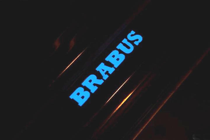 File:W220 brabus entrance panel with illuminated logo.jpg