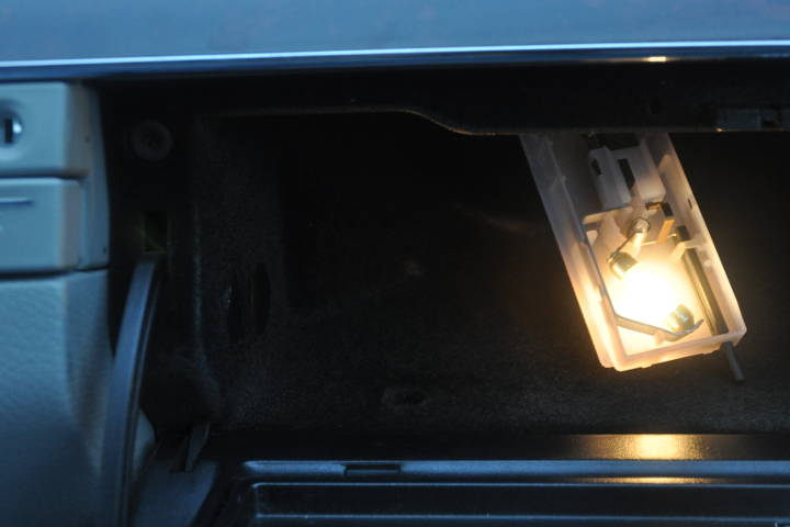 File:W220 glove box light bulb installed on.jpg