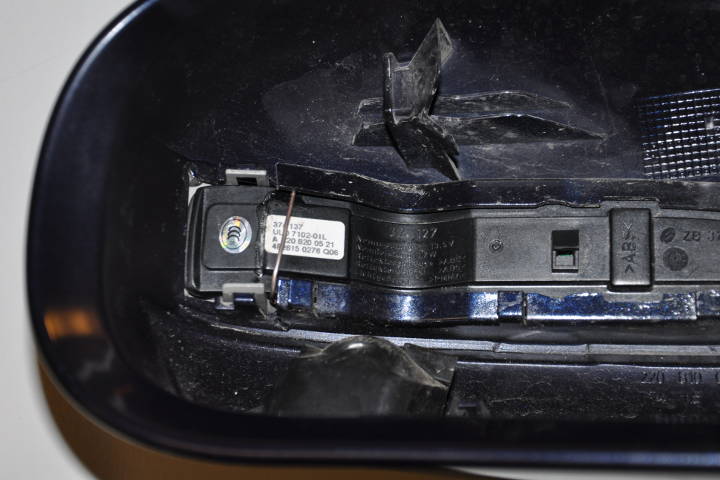 File:W220 mirror turn signal led broken cover clip fix installed.jpg