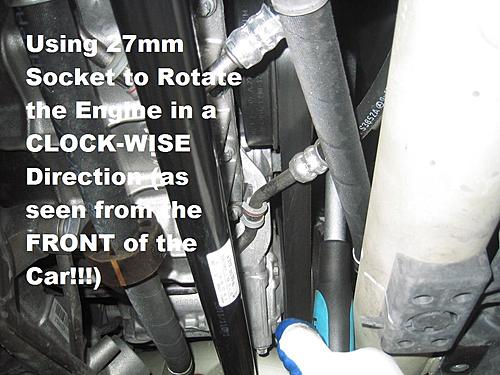 File:Rotate Engine CW to Access Torque Converter Drain Plug Using a 27mm Socket.jpg