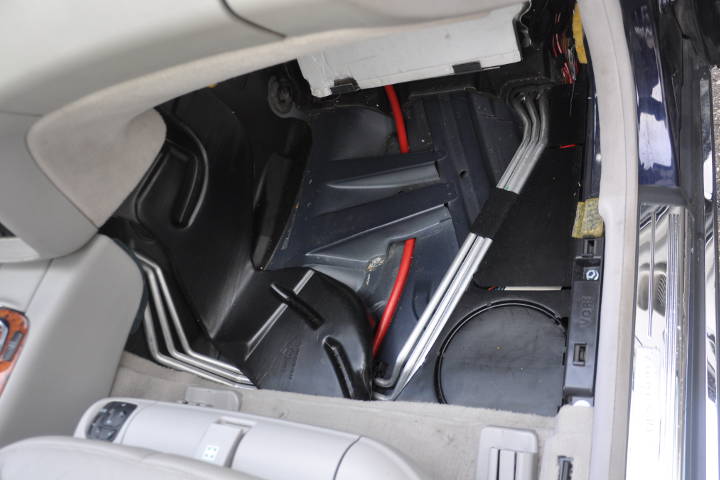 File:W220 right footwell floor covering removed.jpg