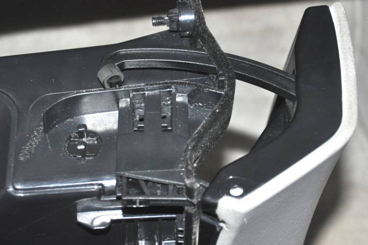 File:W220 adjusting glove box hinge.jpg