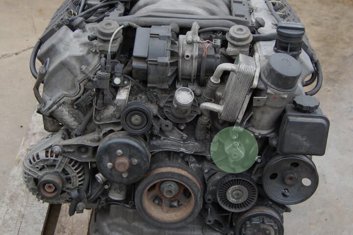 File:W220 M113 engine timing case oil pressure cover.jpg