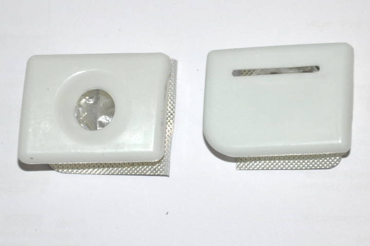 File:W220 glove box buttons prepared for painting.jpg