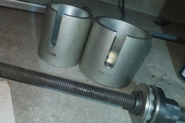 File:W220 spring control arm rubber mount press.jpg