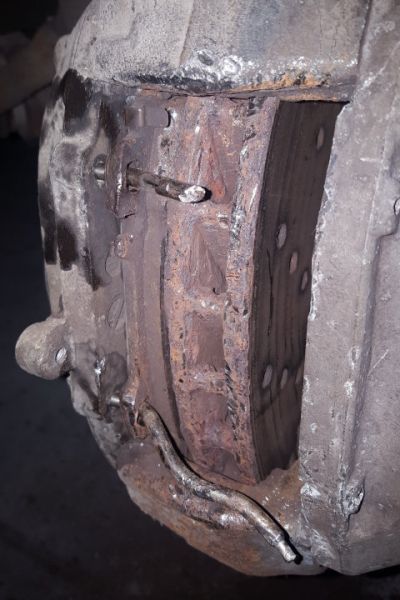 File:W220 front brake removing seized spring bolts.jpg