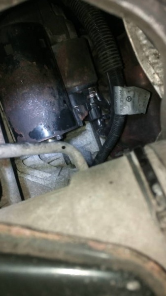 File:W220 starter wiring look through other hole.jpg