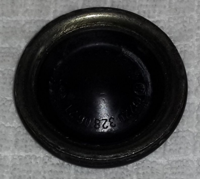 File:W220 AIRmatic Front Strut Top Seal Cover Inside View.JPG