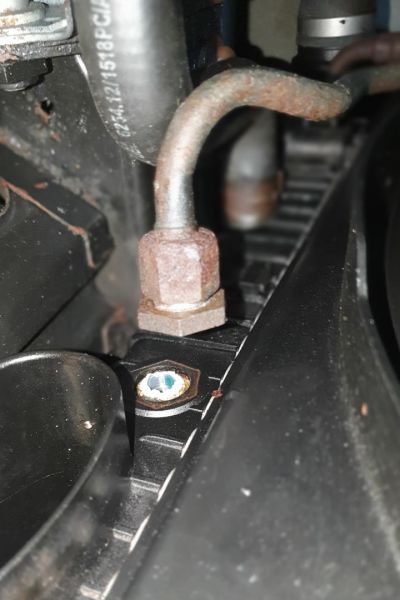 File:W220 transmission cooler connector broken on radiator.jpg