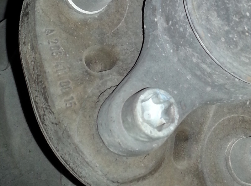 File:W220 Flexi Disc Showing Part Number and Cracking.png