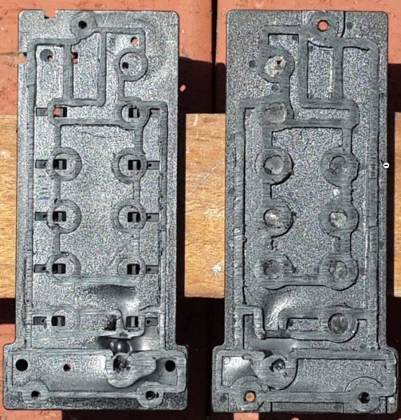 File:W220 PSE Pump Heat Damaged Base Plate Internal View.JPG