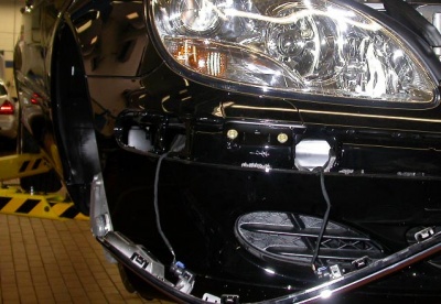 Shown on 220 S500, Engine compartment, right front, Behind bumper cover