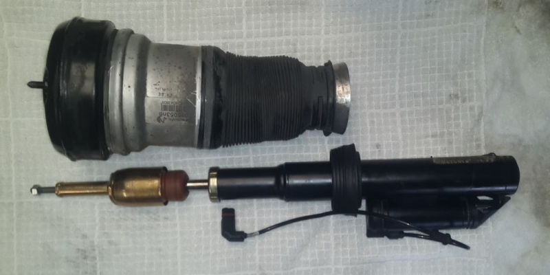 File:W220 AIRmatic Front Strut Air Spring Separated from Damper Unit.JPG