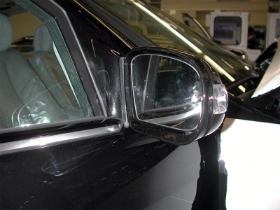 Shown on 220 S500, Right front door, (Behind glass, not visible, close to main component)